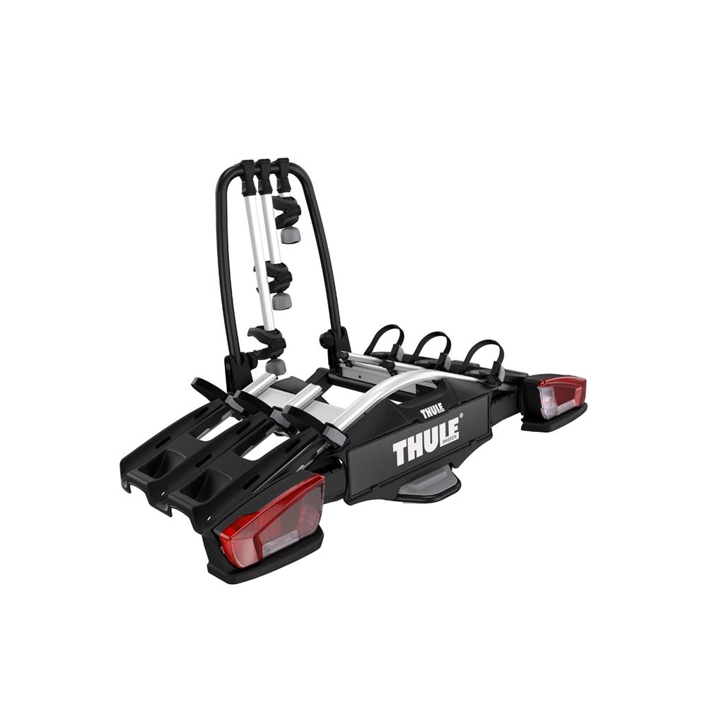 Thule towbar-mounted bicycle carrier, black and silver, with integrated taillights, shown against a white background.